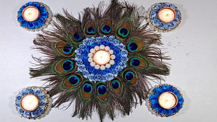 Read more about the article Handmade real Feather & Flower Diya Rangoli -2 designs